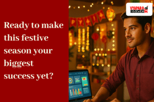 A young Indian entrepreneur in a maroon shirt works confidently on a laptop showing colorful business charts, surrounded by warm festive lights, decorations, and gift boxes. The left side of the image features bold white text on a red background reading “Ready to make this festive season your biggest success yet?” with the Vyapara.lk logo in the top right corner, creating an inspiring business-focused festive atmosphere.